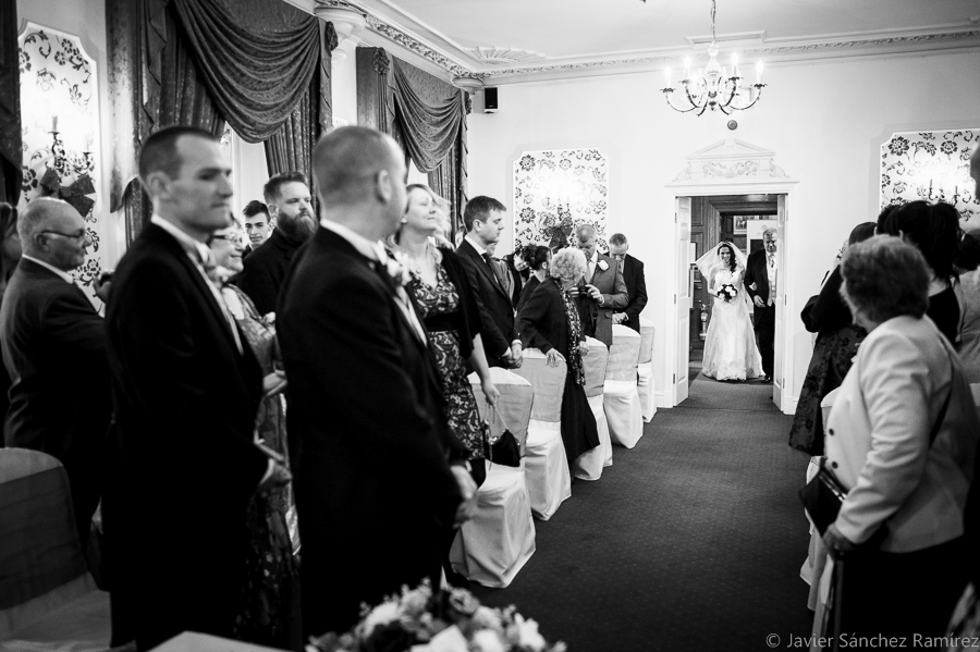 The bride and her father coming to the wedding ceremony